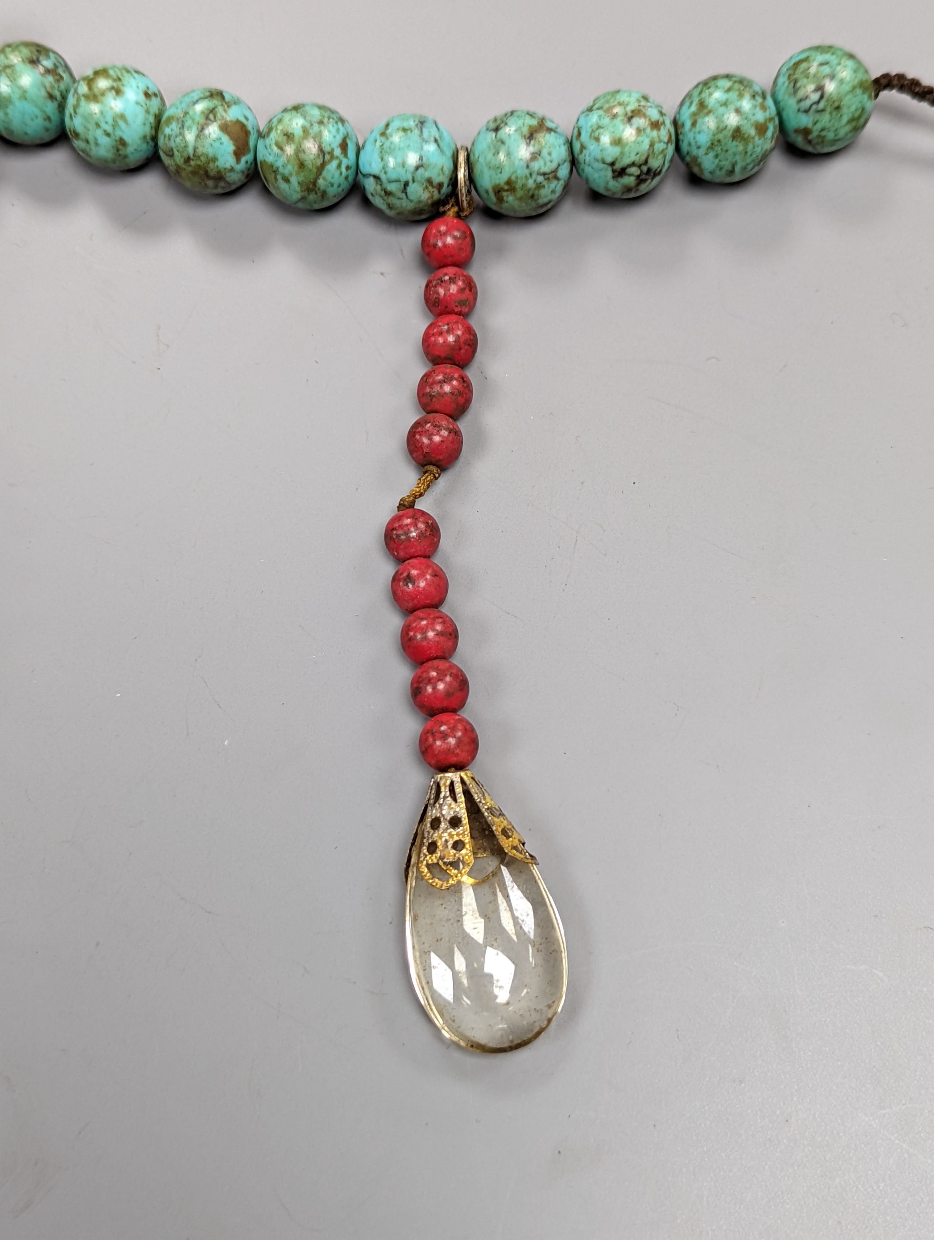 A Chinese turquoise matrix court style necklace in a hardwood box